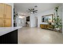 Open floor plan entryway with tile floors and modern decor at 8131 Spring Forest Ln, Wesley Chapel, FL 33544