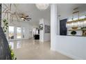 Bright and spacious living area with kitchen views at 8131 Spring Forest Ln, Wesley Chapel, FL 33544