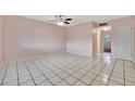 Spacious bedroom with tile floors and ceiling fan at 2 N Fernwood Ave # 16, Clearwater, FL 33765