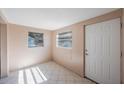 Clean entryway with tile floors and white door at 4135 4Th N Ave, St Petersburg, FL 33713