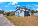 House exterior showcasing a light blue home at 4135 4Th N Ave, St Petersburg, FL 33713