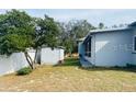 Large backyard with a shed and partially visible fence at 4209 Amber Ridge Ln, Valrico, FL 33594