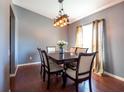 Formal dining room featuring a wood table and a chandelier at 6516 Clair Shore Dr, Apollo Beach, FL 33572