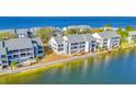 Aerial view of waterfront condos with a beautiful view at 813 Bahia Del Sol Dr # 33, Ruskin, FL 33570