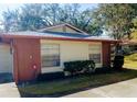 Charming single story home with mature shrubs at 2300 Shelly Dr # C, Palm Harbor, FL 34684