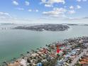 Aerial view showing home's location near waterfront and bridge at 2740 E Vina Del Mar Blvd, St Pete Beach, FL 33706