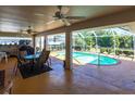 Covered patio overlooking the refreshing pool at 72 Norman St, Port Charlotte, FL 33954