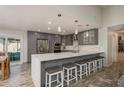 Modern kitchen featuring stainless steel appliances and a large island at 735 Bonnie Blvd, Palm Harbor, FL 34684