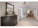 Modern entryway with dark brown console table and mirror at 807 W Minnehaha St, Tampa, FL 33604