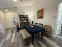 Dining room with a table, bench, and hutch at 8434 Hawbuck St, Trinity, FL 34655