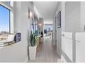 Long hallway with light walls and modern decor at 1120 E Kennedy Blvd # 1514, Tampa, FL 33602