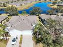 Single-Gathering home with lake view in a community at 2071 Sifield Greens Way # 103, Sun City Center, FL 33573