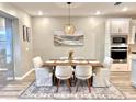 Casual dining area with a wood table and seating for six at 3013 61St E Dr, Ellenton, FL 34222