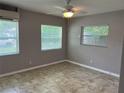 Spacious bedroom with tile floors and window blinds at 3131 17Th N St, St Petersburg, FL 33713