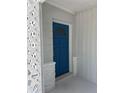 Blue front door entrance with white lattice details at 3131 17Th N St, St Petersburg, FL 33713