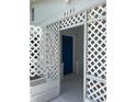 Front porch entryway with white lattice details at 3131 17Th N St, St Petersburg, FL 33713