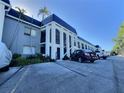 Building exterior with parking and landscaping at 8651 10Th N St # 128, St Petersburg, FL 33702