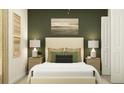 Cozy bedroom with a green accent wall and neutral bedding at 9382 Runaway Breeze Dr, Land O Lakes, FL 34637