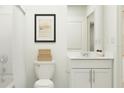 Modern bathroom with white vanity and shower/tub combo at 10206 Alder Green Dr, Riverview, FL 33578