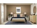 Bright bedroom with wooden bed frame and neutral color palette at 10264 Alder Green Dr, Riverview, FL 33578