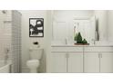 Modern bathroom with double vanity and shower/tub combo at 11555 E 71St Ter, Palmetto, FL 34221