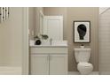 Small bathroom with white vanity, toilet, and shower at 11562 E 71St Ter, Palmetto, FL 34221