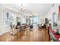 Bright living room with hardwood floors, city views, and comfortable seating at 1208 E Kennedy Blvd # 729, Tampa, FL 33602