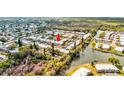 Community overview showcasing canal-front property and neighborhood at 4231 Tamargo Dr # 3, New Port Richey, FL 34652