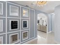 Bright entryway with a stylish mirror feature wall at 900 31St Ne Ave, St Petersburg, FL 33704
