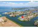 Waterfront property showcasing canal views and boat dock at 1024 Sonata Ln, Apollo Beach, FL 33572