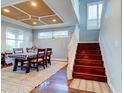 Bright dining room with hardwood floors and a unique ceiling at 12211 Oak Ramble Dr, Spring Hill, FL 34610
