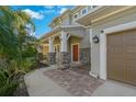 House exterior with a walkway and landscaping at 1317 Lorea Ln, Brandon, FL 33511