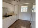 Efficient kitchen featuring ample cabinetry and a double sink at 21480 Olean Blvd, Port Charlotte, FL 33952