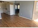 Bright living room with laminate wood flooring and an open floorplan at 21480 Olean Blvd, Port Charlotte, FL 33952