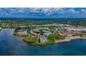 Wide aerial view showing the condo complex and surrounding area at 2700 Bayshore Blvd # 11302, Dunedin, FL 34698