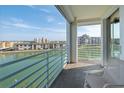 Condo balcony provides tranquil waterfront views, serene atmosphere and comfortable seating at 7963 Sailboat Key S Blvd # 408, South Pasadena, FL 33707