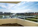 Condo balcony offering beautiful view of the marina and waterfront community at 7963 Sailboat Key S Blvd # 408, South Pasadena, FL 33707