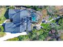 Aerial view showcasing home, pool, and lush backyard at 105 Locust Dr, Brandon, FL 33511