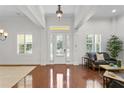 Bright and spacious entryway with hardwood floors and a view to the backyard at 4023 W Horatio St, Tampa, FL 33609