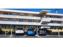 Condo building with covered parking and cars at 4915 Bay Ne St # 335, St Petersburg, FL 33703