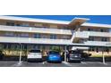 Condo building with covered parking and cars at 4915 Bay Ne St # 335, St Petersburg, FL 33703
