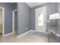Bright entryway with gray walls and white door at 6206 Windship Ct, Tampa, FL 33647