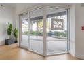 Bright interior entryway with glass doors and modern flooring at 1010 Central Ave # 106, St Petersburg, FL 33705