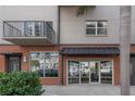 Modern retail space entrance with glass doors and awning at 1010 Central Ave # 106, St Petersburg, FL 33705