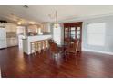 Kitchen features breakfast bar and adjoining dining area at 112 Saint Pierres Way, Apollo Beach, FL 33572