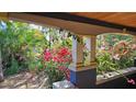 Bright and airy porch with lush tropical landscaping at 2445 3Rd N Ave, St Petersburg, FL 33713