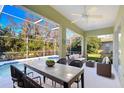 Enjoy relaxing views from the covered lanai overlooking the pool at 5107 Lady Rose Ct, Lutz, FL 33558