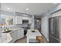 Modern kitchen with stainless steel appliances and island at 6191 Bahia Del Mar Blvd # 201, St Petersburg, FL 33715