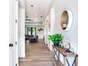 Open entryway with view of living room and high ceilings at 631 12Th N Ave, Safety Harbor, FL 34695