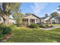 Renovated craftsman home with a spacious front yard at 810 E Conover St, Tampa, FL 33603